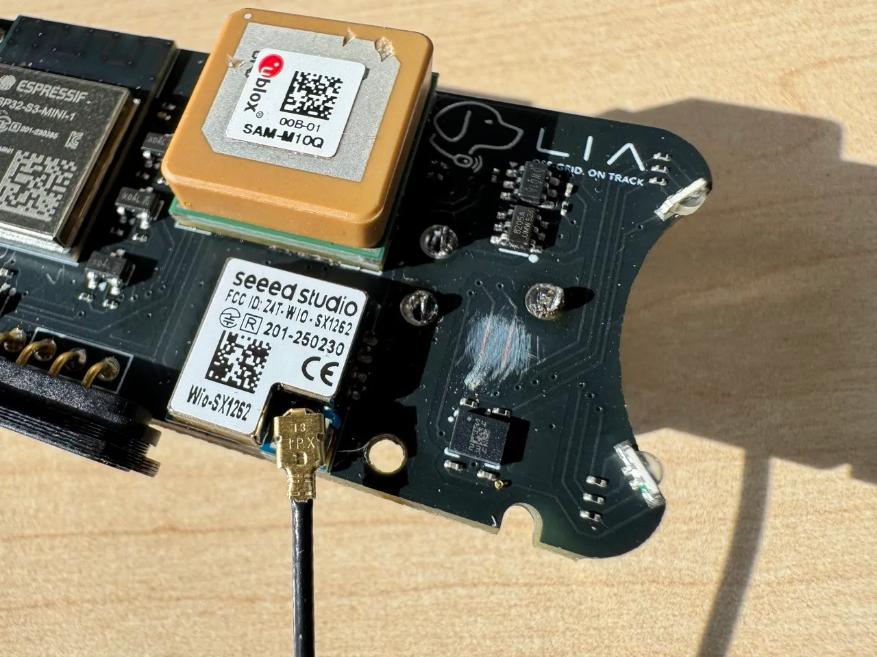 The board before rework, SDA/SCL soldermask still intact over the crossed traces