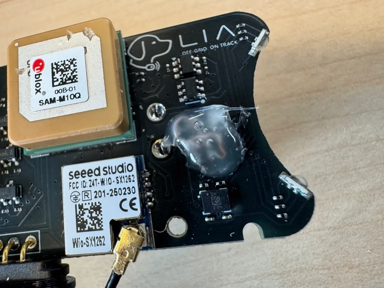The rework covered in a blob of hot glue for protection