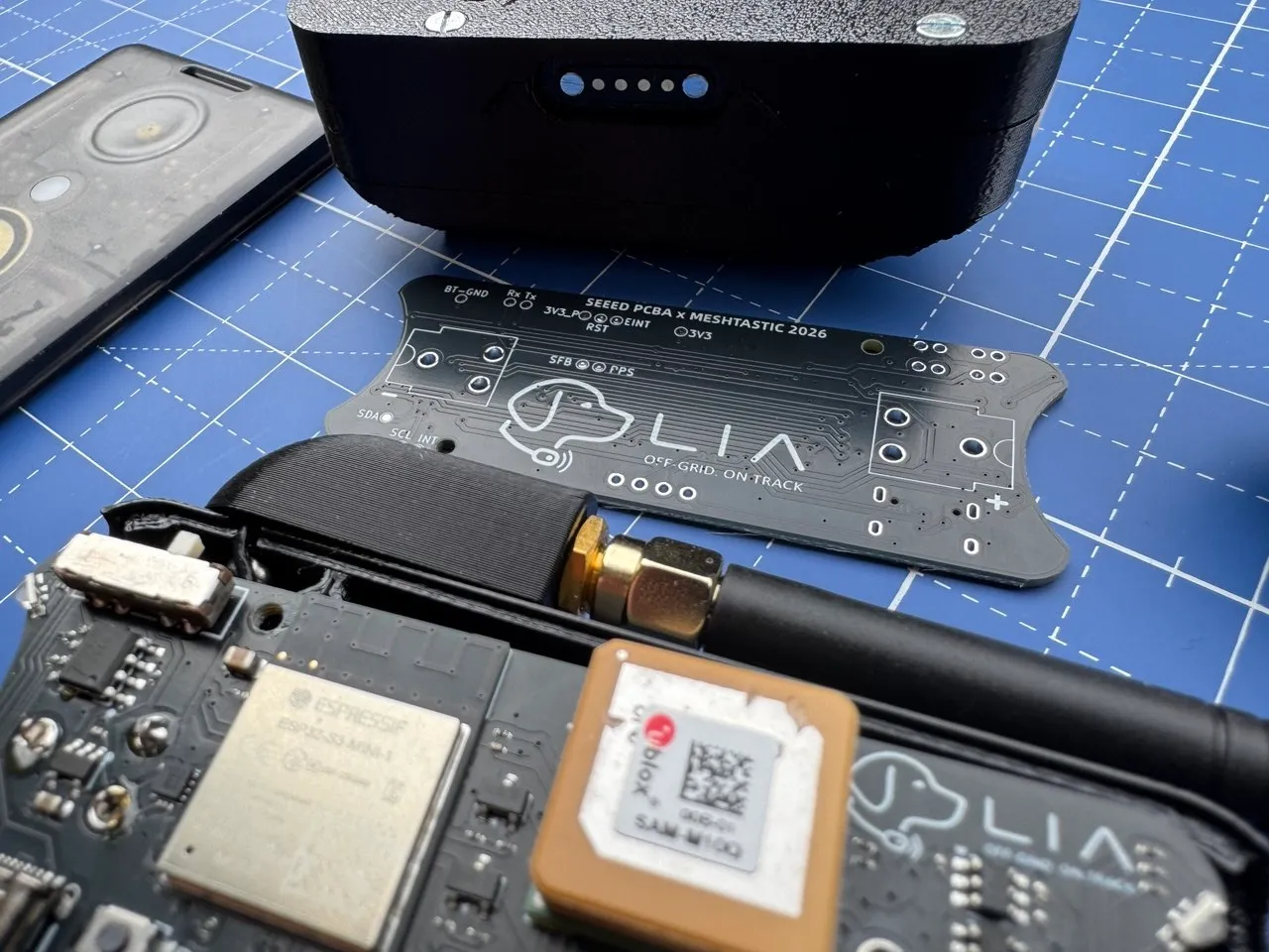 Assembled and open LIA boards side by side with the enclosure shell