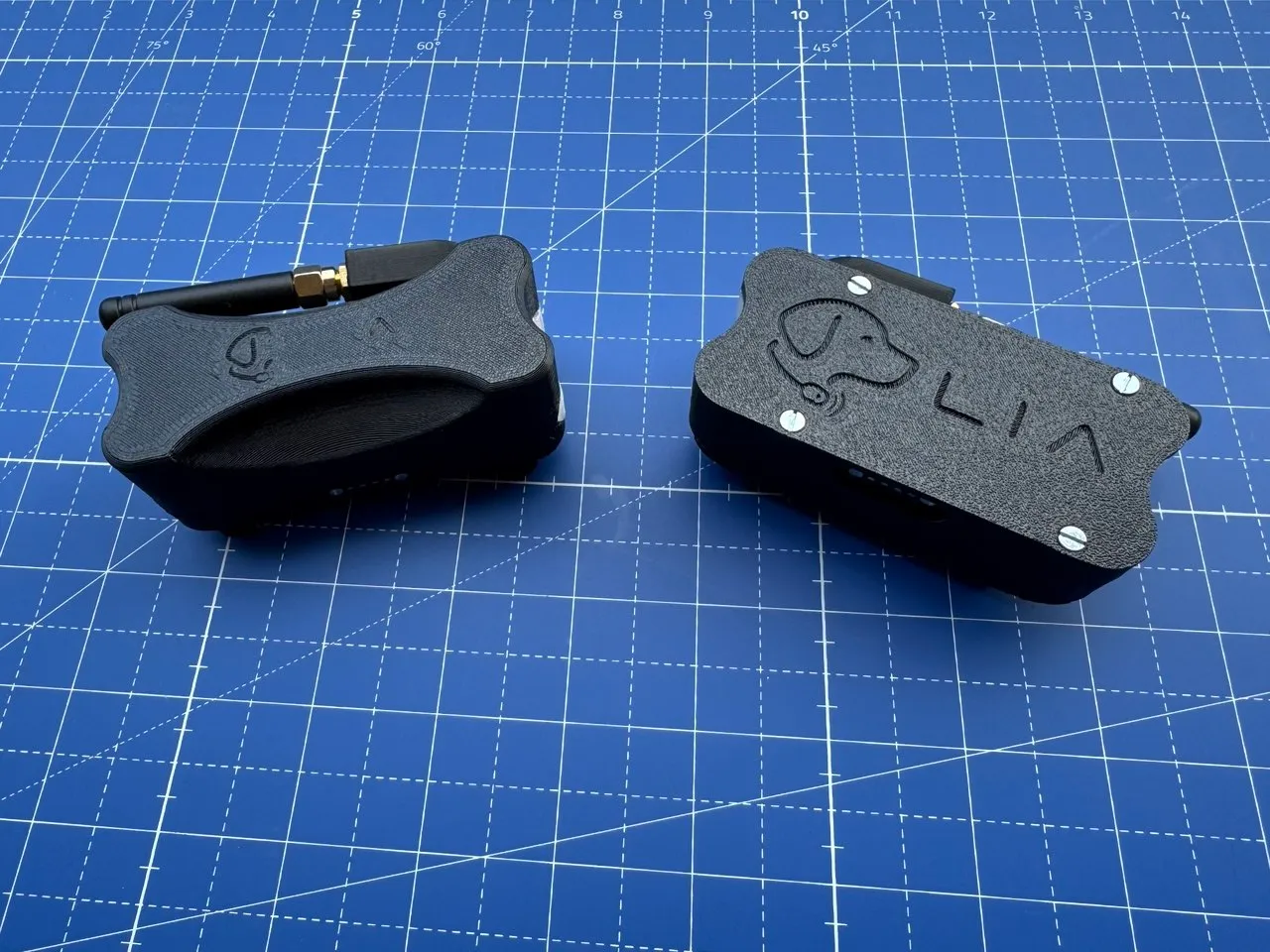 Two bone-shaped enclosure shells compared side by side