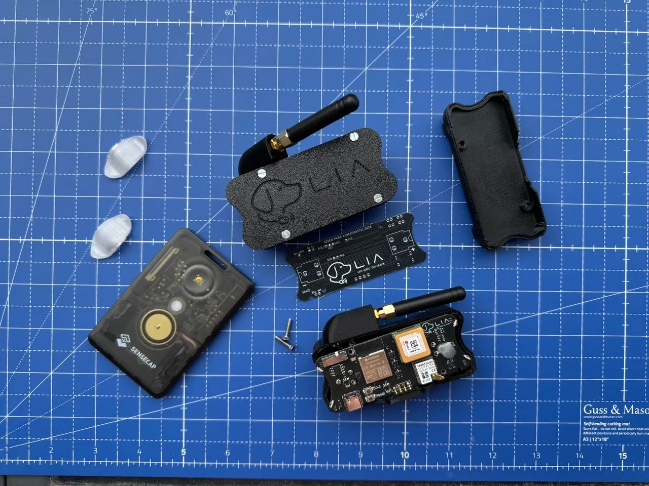 Exploded view of the board, enclosure shells, and hardware laid out
